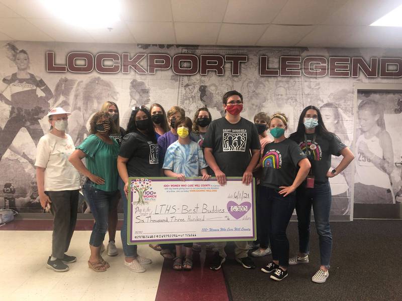 100+ Women Who Care of Will County donated $6,300 to the  Best Buddies at Lockport Township High School on June 1.