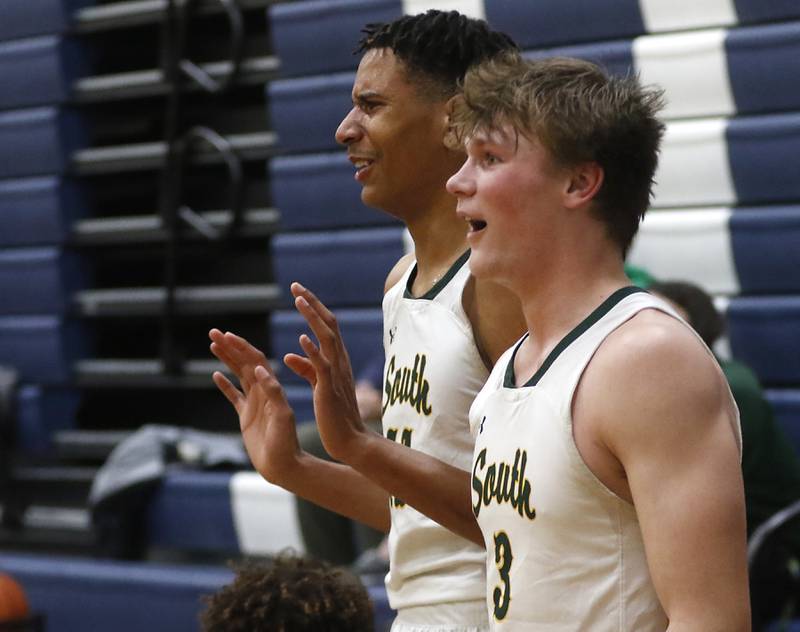 Crystal Lake South's Christian Rohde and Colton Hess celebrate as they watch the final minute of the IHSA Class 3A Cary-Grove Boys Basketball Regional Championship game against Wheaton Academy on Friday, Feb. 23, 2024 at Cary-Grove High School.