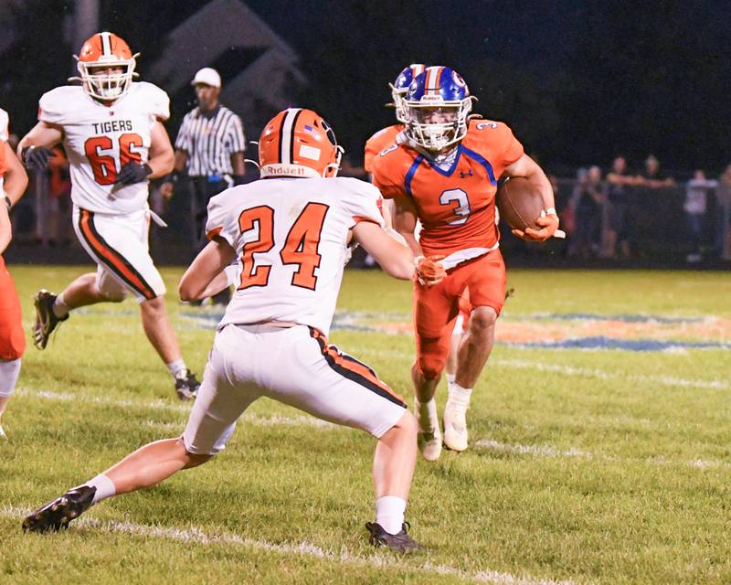Genoa-Kingston Brody Engel (3) runs the ball before being tackled in the second quarter by Byron players at home at Geno-Kingston on Friday Sep 16th.