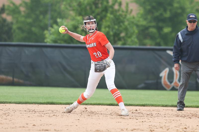 Lincoln-Way West’s Kayla Mahoney makes a throw to first against Lincoln-Way Central on Tuesday, May 14, 2024 in New Lenox.
