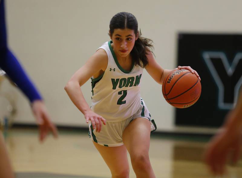 York's Anna Filosa (2) drives to the basket during the girls varsity basketball game between Lyons Township and York high schools on Friday, Dec. 16, 2022 in Elmhurst, IL.