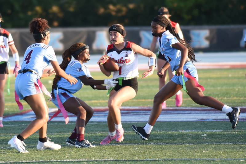 Bradley-Bourbonnais' Georgia Kohl (1) looks for a way through a trio of Kankakee defenders during the All-City game at Kankakee Wednesday, Sept. 17, 2025.