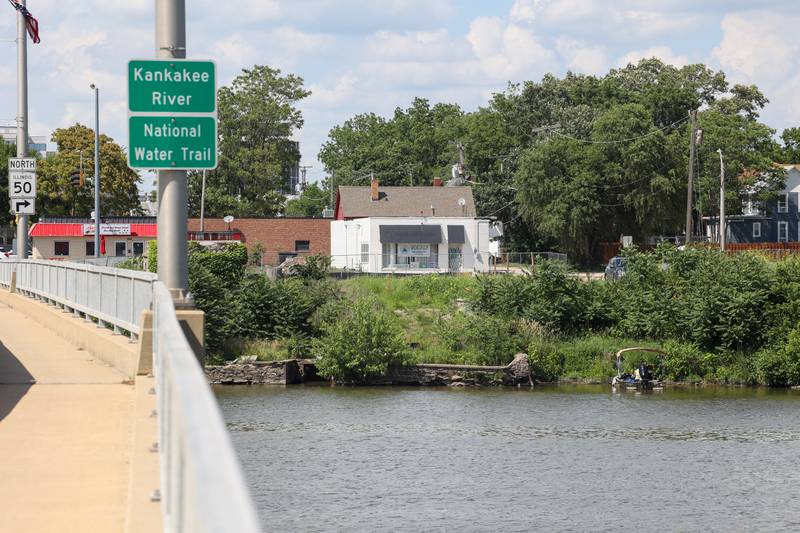 The search for the endangered river mussels is underway at the site of Kankakee's East Riverwalk along the Kankakee River on Tuesday, June 24, 2025. Seven divers with GZA GeoEnvironmental are deployed for the mussels search and the process will take an anticipated eight days of relocation, but the goal is to finish it sooner.