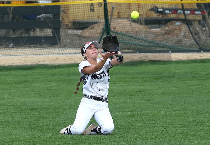 Kaneland's Gianna Cellini makes a sliding catch Tuesday, April 22, 2025, during their game at Sycamore High School.