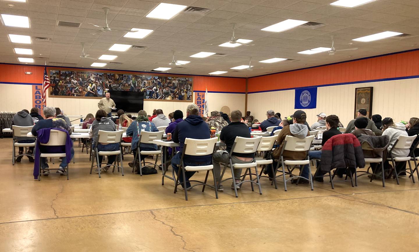 Dan Jackson (standing) speaks to a large hunters' safety class at Local 393 in Marseilles last weekend.