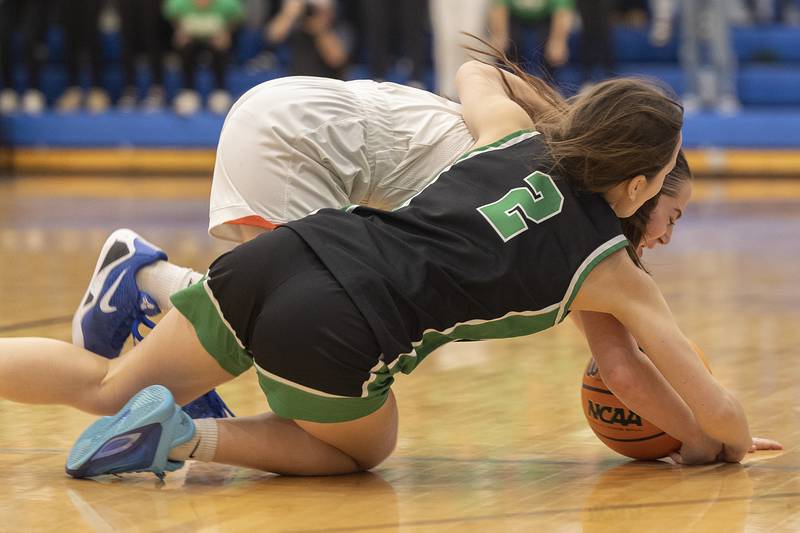 Eastland’s Sienna Peterson and Wethersfield’s Emilia Escareno dives for a loose ball Tuesday, Feb. 24, 2026, in the Class 1A sectional at Eastland High School.
