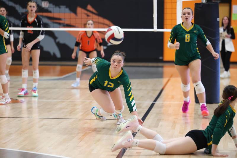Grant Park's Abby Garcia attempts to dive and save a rogue ball during the Dragon's loss in two sets, 25-22, 25-23, to Beecher in the RVC championship game on Monday, Oct. 20, 2025, at Beecher High School.