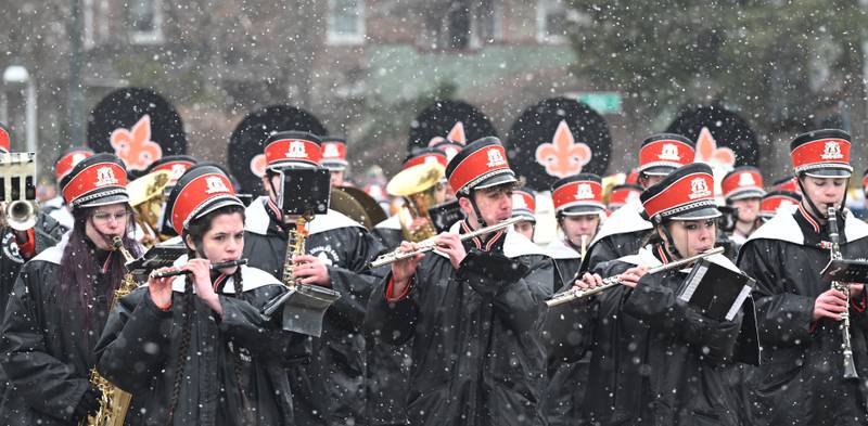 The St. Charles East High School Marching Band plays during the St. Charles St. Patrick’s Parade on Saturday, March 14, 2026.
