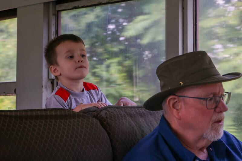 Child peeks over seat during train ride on Saturday, September 28, 2024 in Bureau.