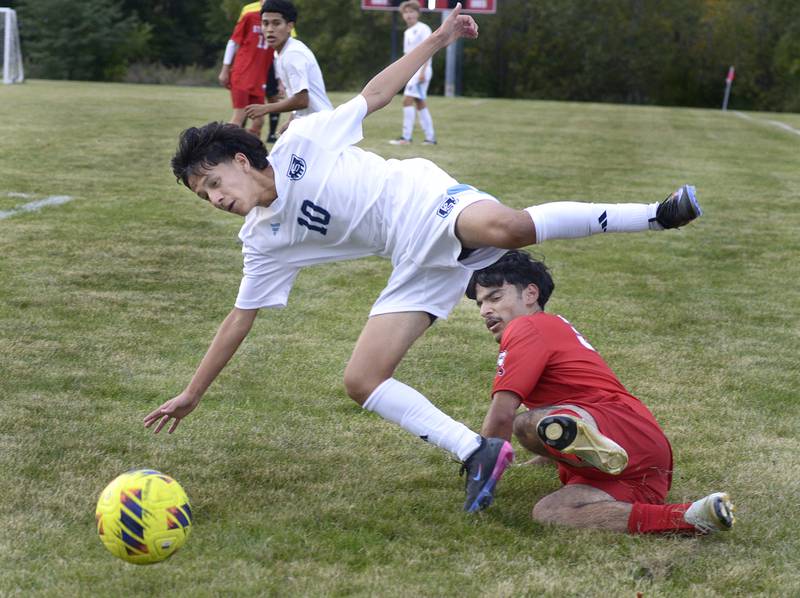 Plainfield South’s Manuel Mejia (10) and Streator’s Gabe Granados collide while racing to the ball Tuesday, Sept. 9, 2025, at the James Street Recreation Area in Streator.