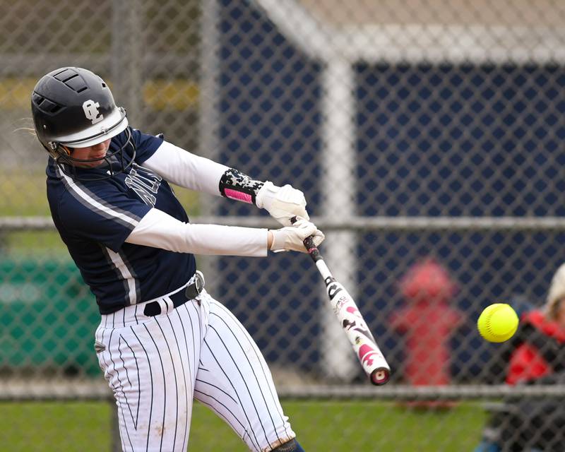 Oswego East’s Carleigh Gregory makes contact with the ball during the game on Thursday April 17, 2025, while taking on Plainfield North held at Oswego East High School.