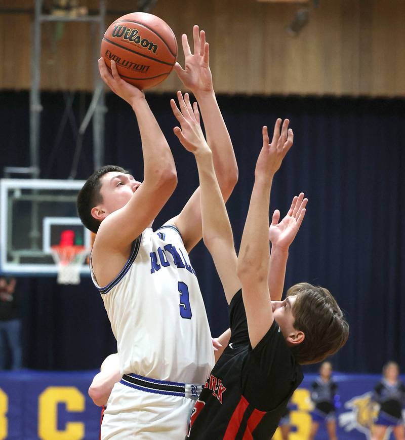 Hinckley-Big Rock's Ben Hintzsche shoots over an Indian Creek defender during their game Tuesday, Jan. 31, 2023, in the Little 10 Conference Basketball Tournament at Somonauk High School.