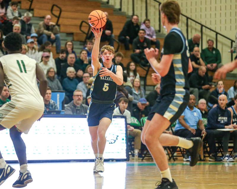 Nazareth's Andrew Hyland (5) tosses up an alley-oop pass attempt during their Jack Tosh Holiday Classic basketball tournament game between Nazareth vs Glenbard West. Thursday Dec 26, 2024 in Elmhurst.