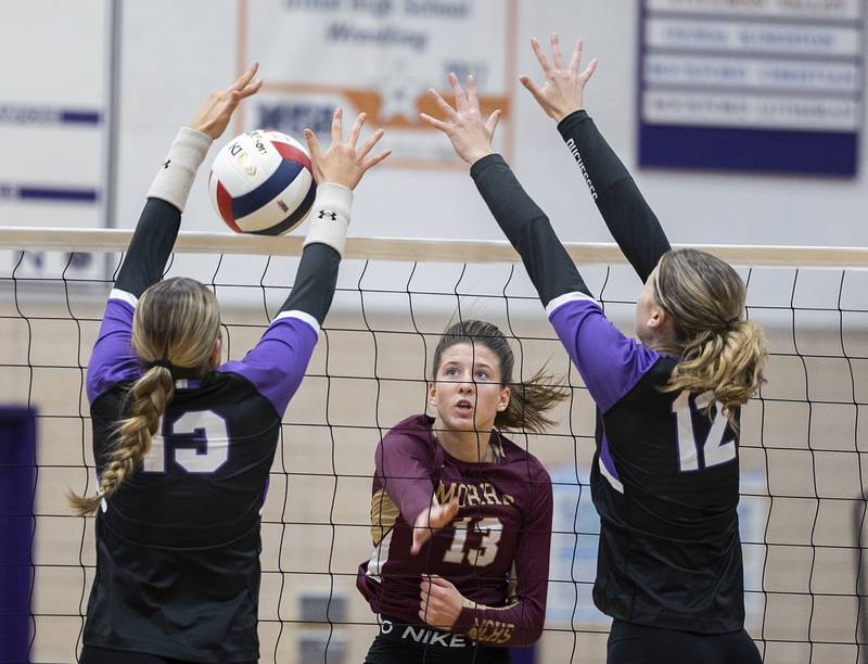Morris’ Tessa Shannon hammers a shot against Dixon Thursday, Oct. 31, 2024 in the class 3A regional championship at Dixon High School.
