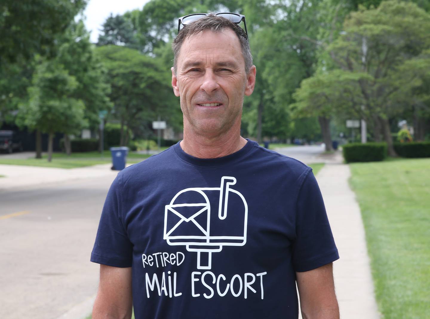 Jeff Gerber poses for a photo photo on Bucklin and Oconor Avenue on Monday, May 20, 2024 in La Salle. The Gerber family has been delivering the mail for the United States Postal Service for a combined 60 years in the Illinois Valley. The brothers have recently retired from the USPS.