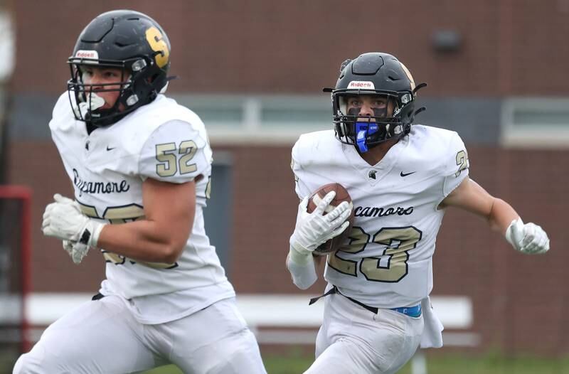 Sycamore's Dylan Hodges follows the blocking of Cristian Spartz Saturday, Nov. 9, 2024 during their Class 5A second-round playoff game against Westinghouse at Knute Rockne Stadium in Chicago.