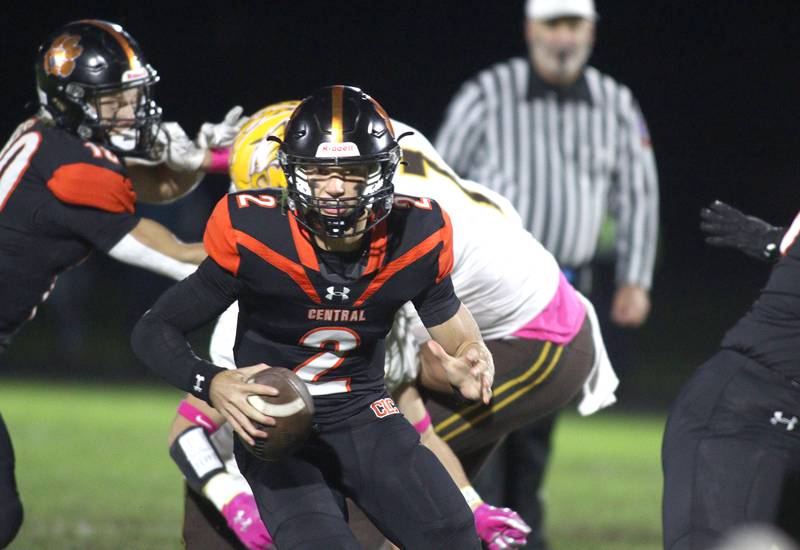 Crystal Lake Central’s Jason Penza looks for an option against Jacobs in varsity football at Metcalf Field on the campus of Crystal Lake Central Friday night.
