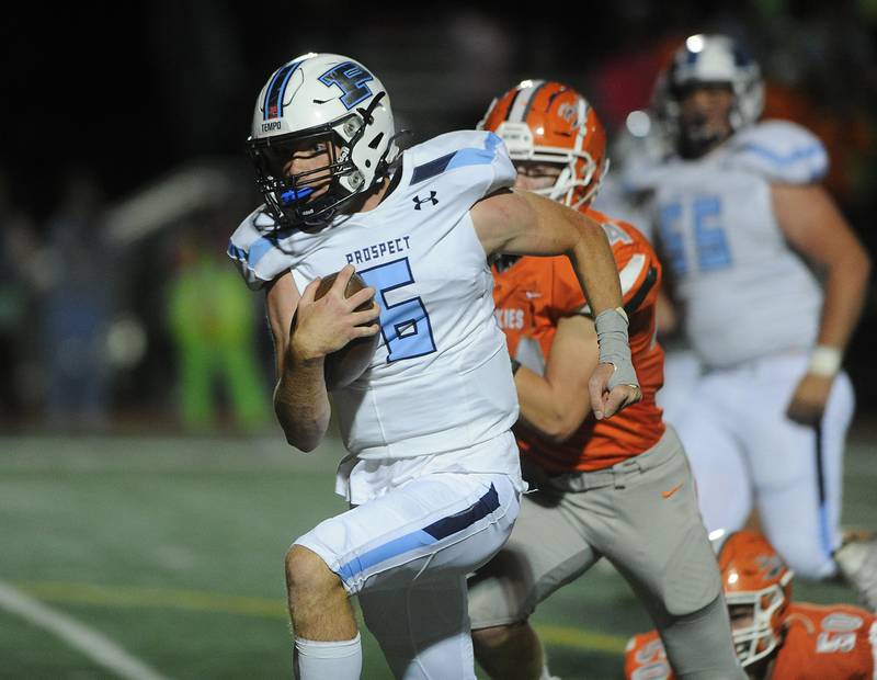 Prospect's quarterback Frank Covey runs over the Hersey defense for a touchdown in boys football at Hersey on Friday.