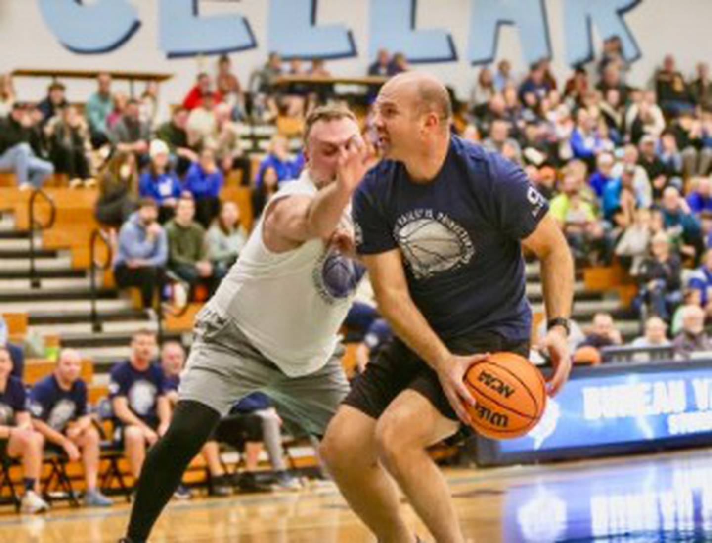 BV alum Justin Yepsen (2000) makes his moves on PHS alum Ben Rapp (1998) during Sunday's Alumni Game at the Storm Cellar.