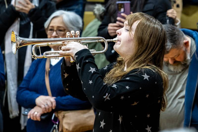 LTHS student Ashley Biggus plays “Taps” for a moment of silence during Lockport Township High School’s 11th Annual Veteran Night Celebration Ceremony on Jan. 23, 2026.