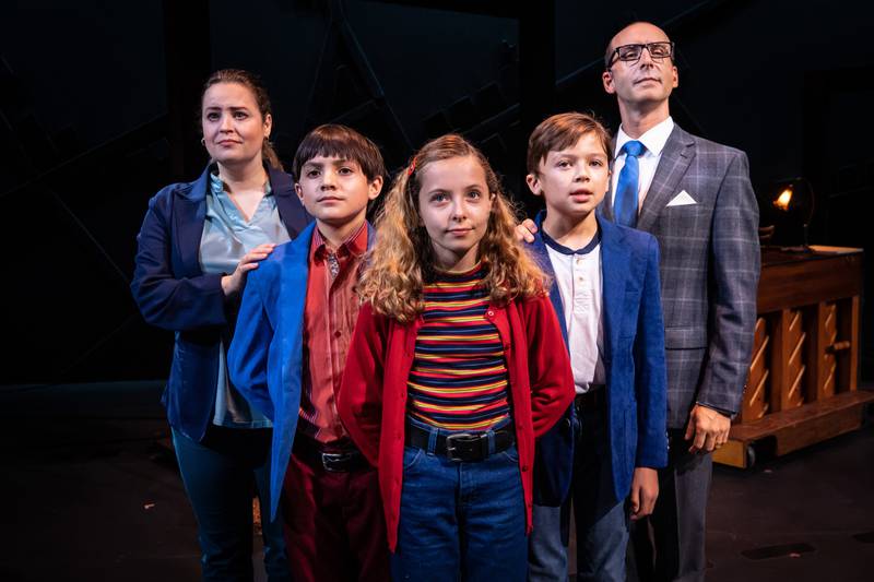 (from left) Emily Rohm plays Helen, Ezekiel Ruiz is John, Maya Keane is Small Alison, Jaxon Mitchell plays Christian and Stephen Schellhardt is Bruce in Fun Home. Paramount Theatre’s BOLD Series production of the Tony Award-winning musical runs through September 18, 2022 at Paramount’s Copley Theatre, 8 E. Galena Blvd. in downtown Aurora. Tickets: paramountaurora.com or (630) 896-6666. Note: Keane rotates in the role of Small Alison with Milla Liss.