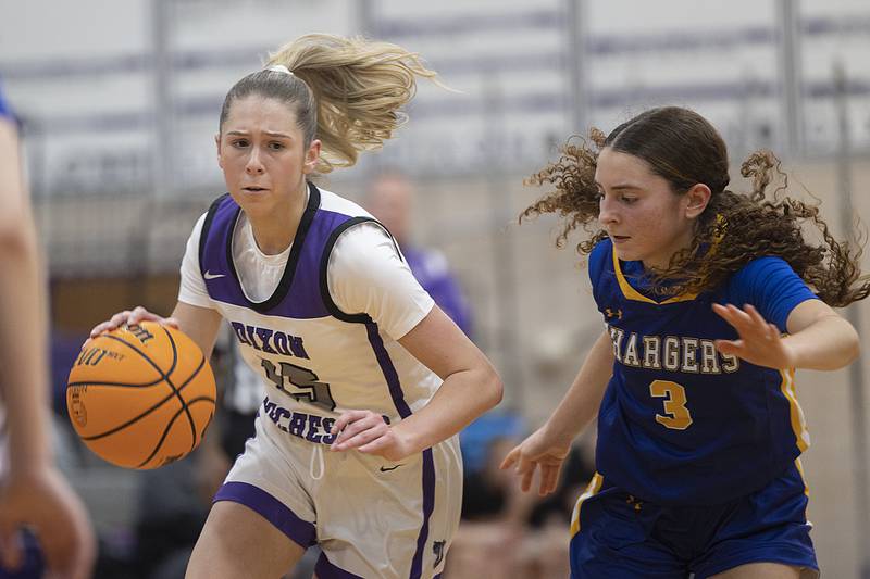 Dixon's Morgan Hargrove handles the ball against Aurora Central’s Gina Dutkanych Thursday, Dec. 26, 2024, during the Dixon Girl’s KSB Holiday Basketball Classic.