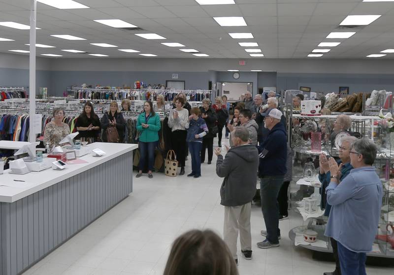 Members of the community gather at the Princeton Closet as they distributed $215,000 to 35 organizations throughout Bureau County on Tuesday, Jan. 17, 2023 in Princeton.