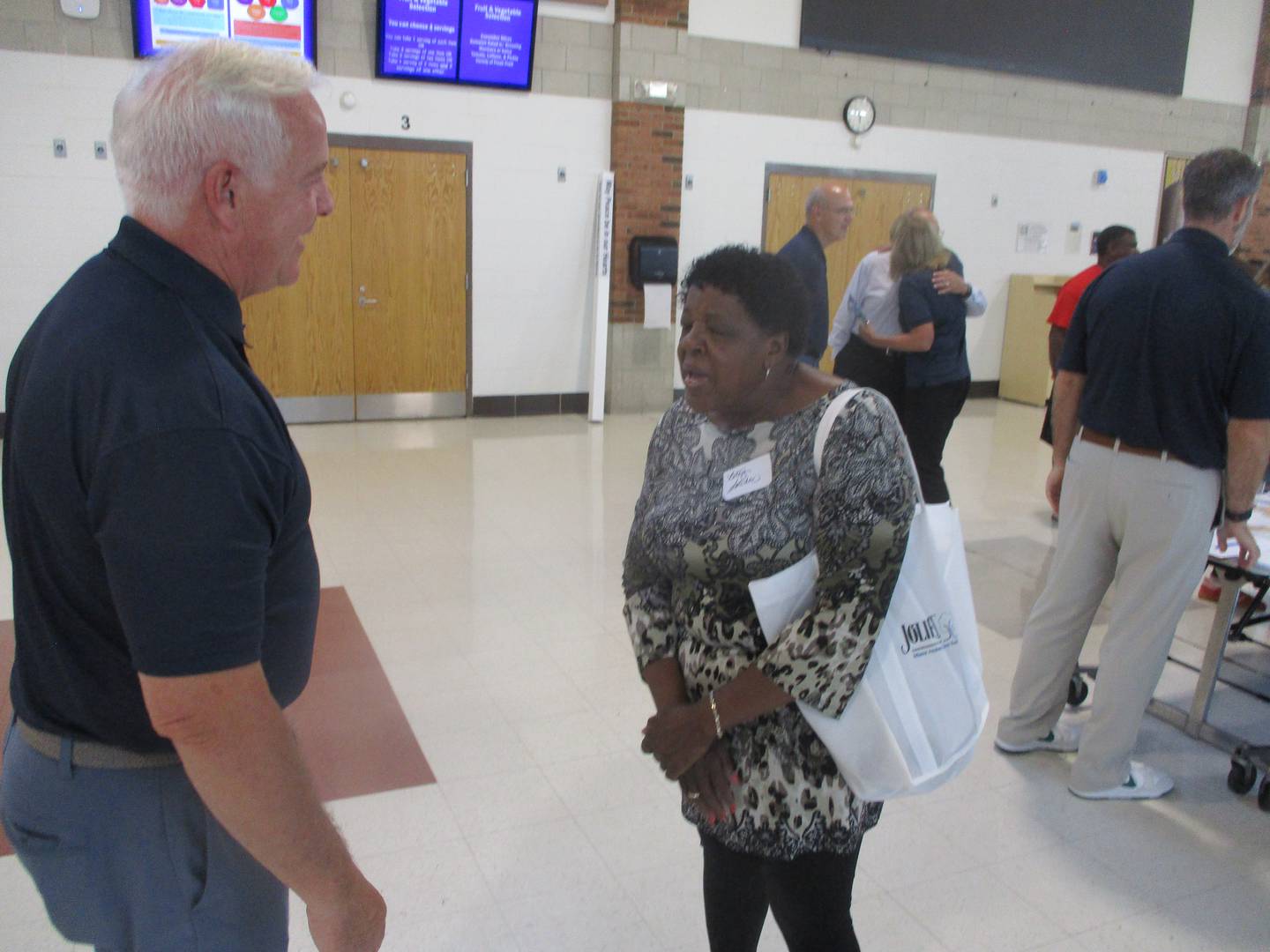 Betsy Satcher, president of the East and Southeast Regional Alliance in Joliet, talks with Mayor Terry D'Arcy at a workshop held Wednesday to collect public input for a comprehensive plan being developed for Joliet. Sept. 17, 2025