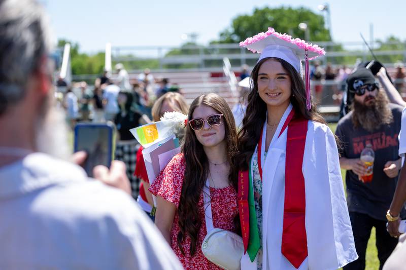Chloe Hicks poses for photo after graduating on Sunday, May 18, 2025 at Hall High School in Spring Valley.