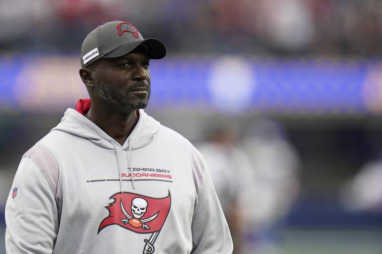 Tampa Bay Buccaneers defensive coordinator Todd Bowles walks on the field before facing the Los Angeles Rams on Sept. 26, 2021.