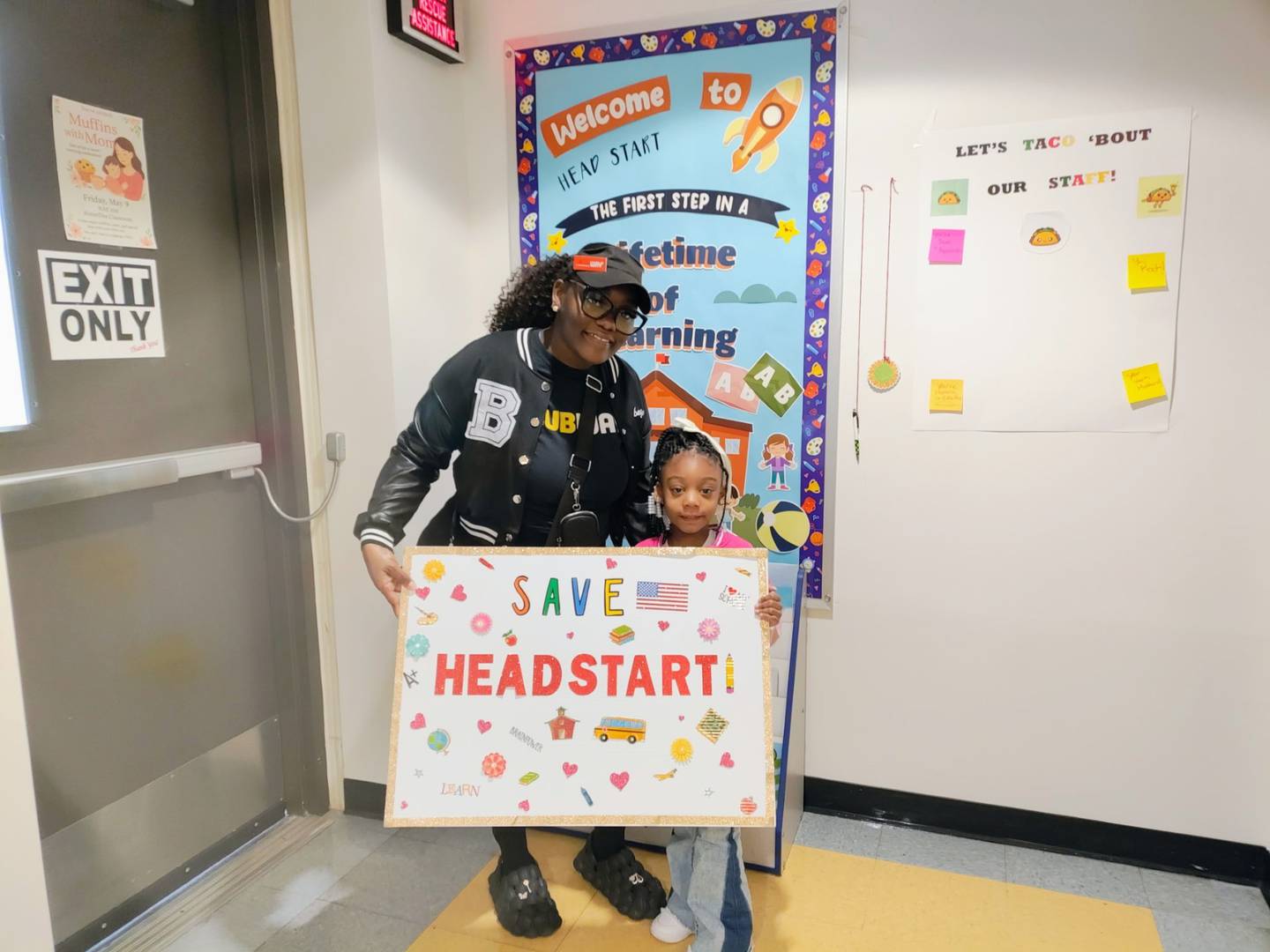 Starkesha Crayton is pictured with her daughter is Amina Crayton in support of Will County's Head Start program.