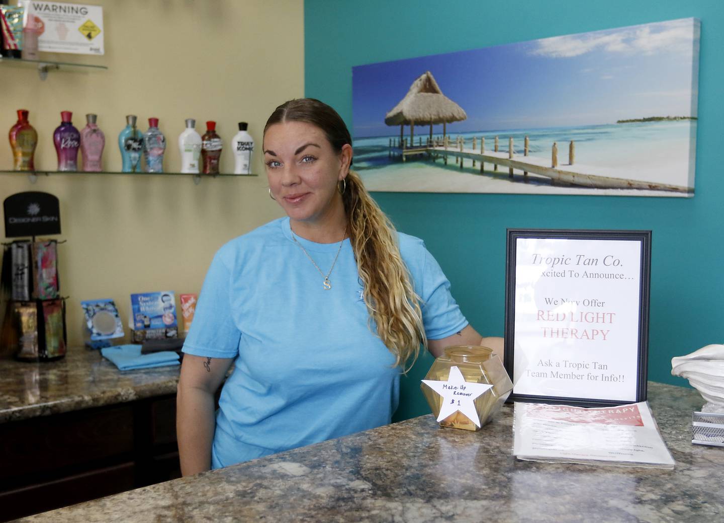 Stephanie Szablewsk, owner of Tropic Tan Company in Crystal Lake, inside her tanning salon Friday, Feb. 25, 2022. She plans to open the tanning salon 24 hours a day beginning in early March.