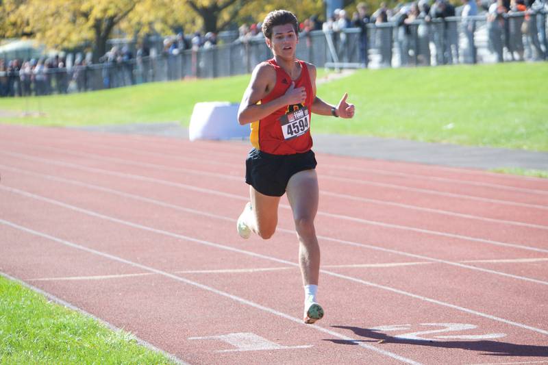 Batavia's Quintin Lowe finishes in first place at the DuKane Conference Cross Country Meet on Saturday, Oct, 15, 2022 in Roselle.