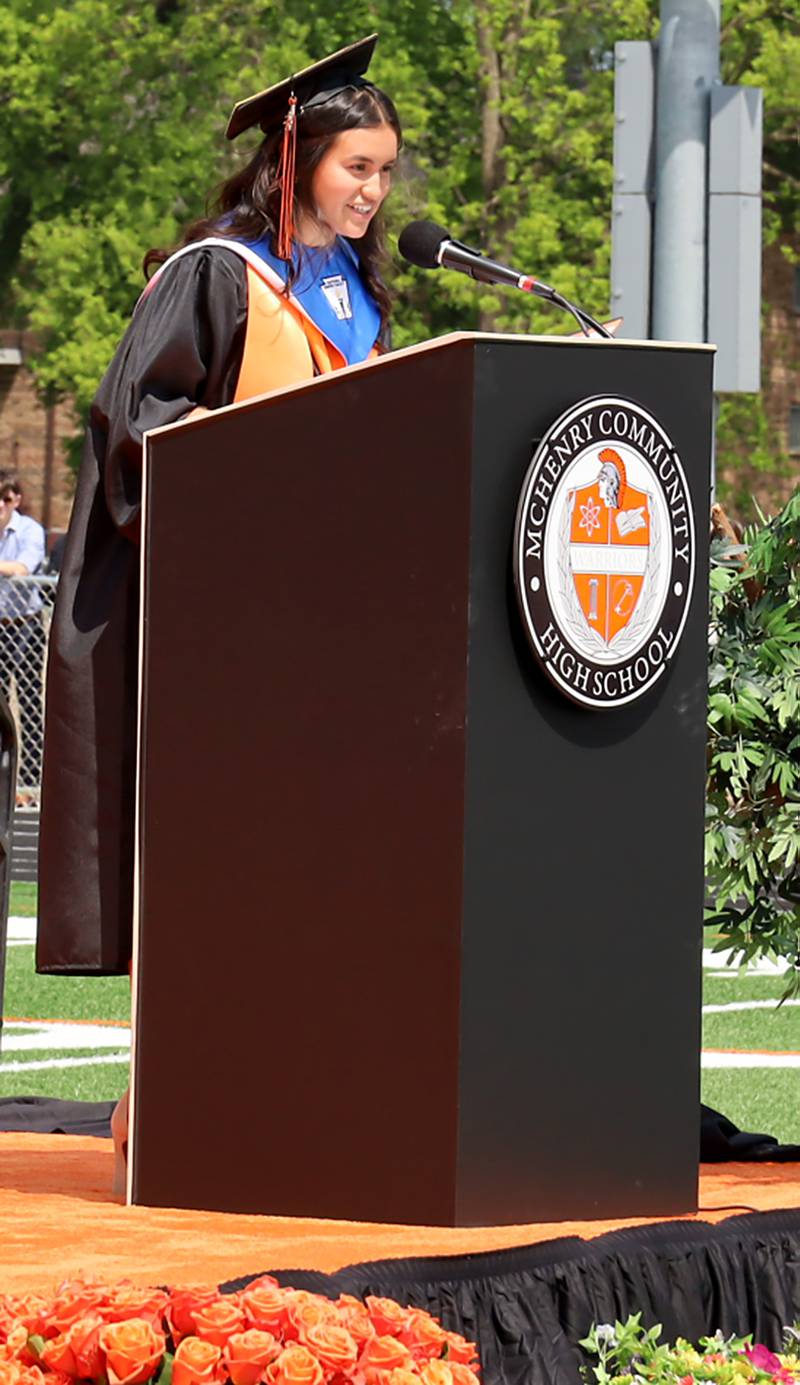 Graduate Daisy Lomeli speaks Saturday, May 20, 2023, during the McHenry Community High School Graduation Ceremony for class of 2023 at McCracken Athletic Field in McHenry.