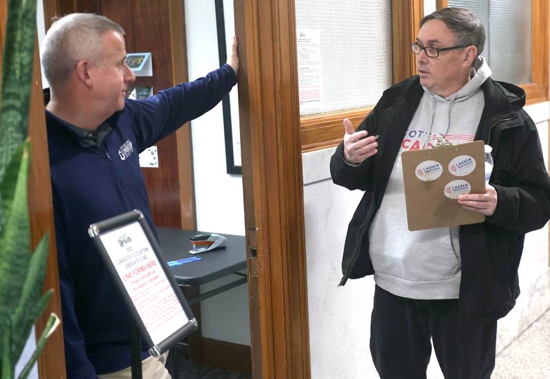 DeKalb City Council Ward 5 alderman Scott McAdams talks to mayor Cohen Barnes Monday, Dec. 12, 2022, at City Hall. McAdams, who is running for re-election, was among the first candidates in line Monday at 8:30 a.m. when filing opened at City Hall.