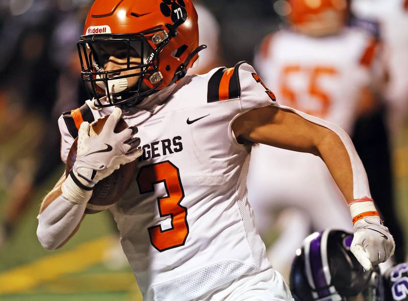 Wheaton Warrenville South's Owen Yorke (3) runs with the ball during the 7A first-round playoff game between Wheaton Warrenville South and Downers Grove North high schools on Friday, Nov. 1, 2024 in Downers Grove.