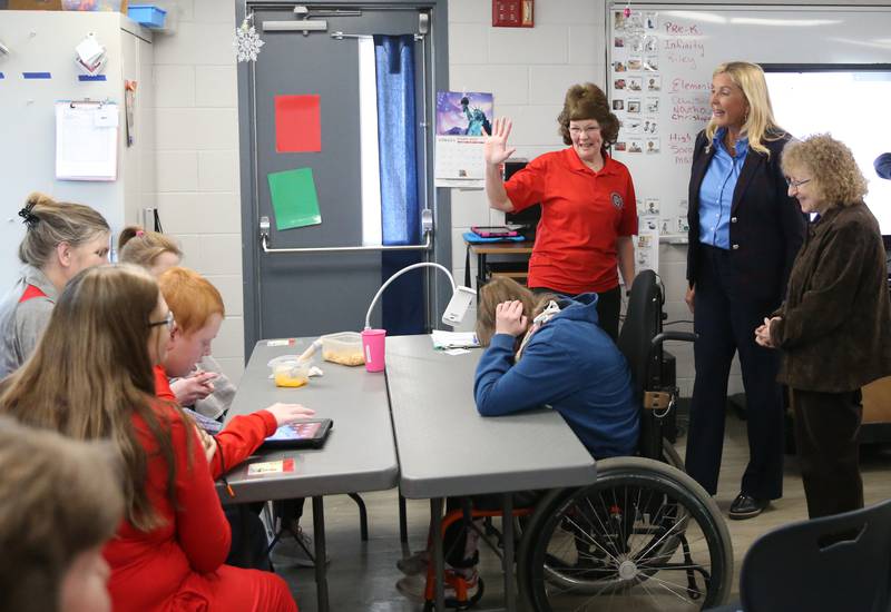 Lighted Way Executive Director Jessica Kreiser and State Sen. Sue Rezin (R-Morris) interact with students at the current Lighted Way building on Monday, Jan. 23, 2023 in La Salle. Lighted Way will be moving this summer from their 10,000-square-foot center to a 33,000-square-foot center and will allow better programming and more activities.