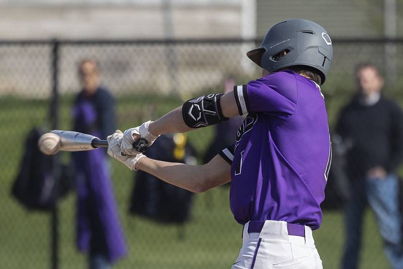 Dixon’s Alex Harrison makes contact at the plate against Rock Falls on Tuesday, April 18, 2023.