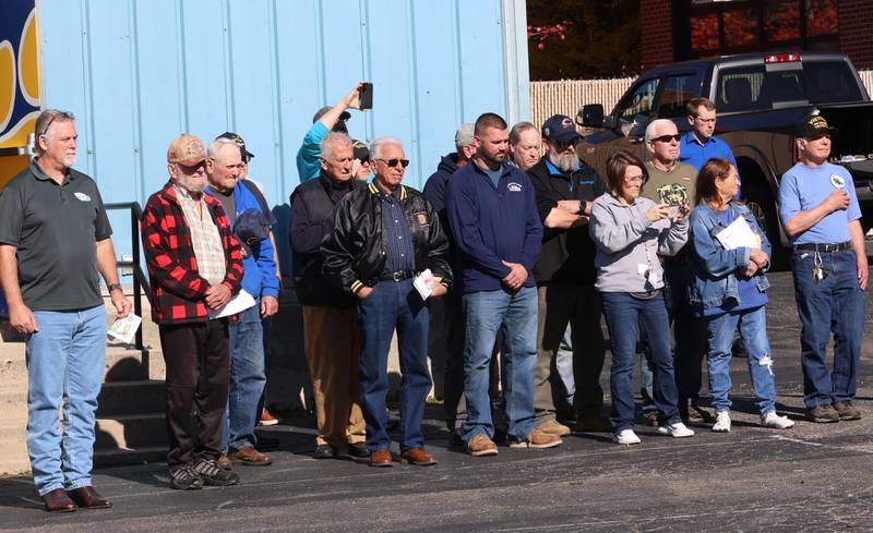 Veterans watch the 21 gun salute during the Veterans Day program on Friday, Nov. 7, 2025 at Logan Jr. High in Princeton .