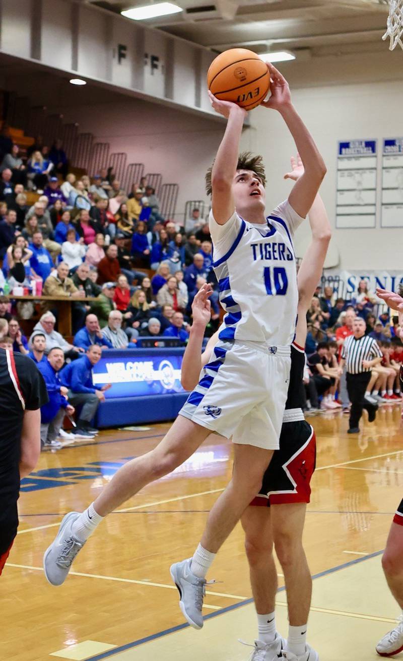 Princeton senior Wyatt Koning shoots in the second half during Friday's Senior Night game against Hall. The Tigers won 51-29.