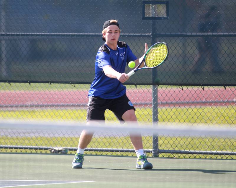Geneva’s Tyler Masoncup returns the ball during a doubles match with partner and brother, Aaron Masoncup (not pictured), in the state championship preliminaries at Buffalo Grove High School on Thursday, May 23, 2024.