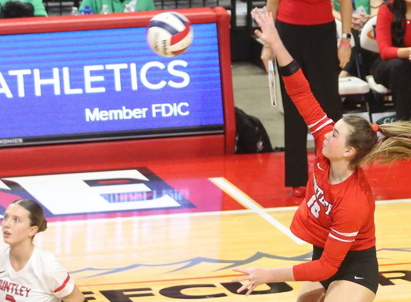 Huntley's Sienna Robertson sends the ball to the Benet Academy side of the net during the Class 4A State semifinal game on Friday, Nov. 15, 2024 at CEFCU Arena in Normal.
