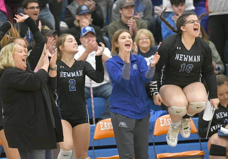 Newman's coach Debbi Kelly, far left, Sophia Ely, Ellie Rude, and Leah Kalina celebrate a point during the Eastland Supersectional in Lanark on Friday, Nov.4. Newman won the match to advance to the state finals next week.