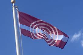 Lockport raises newly designed city flag at Heritage Village
