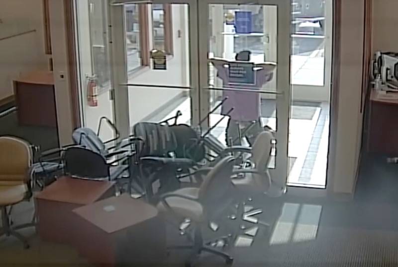 Gregory Walker, 65, of Crest Hill, surrendering after taking hostages at Fifth Third Bank on May 10, 2022, in Romeoville. Walker died after he was shot by Will County Sheriff's Lt. John Allen.