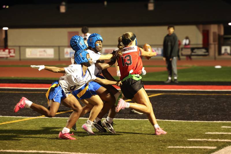 Bradley-Bourbonnais' Sophia Darling gets past a host of Joliet Central defenders to score a touchdown during the Boilermakers' 60-7 victory over Joliet Central in the season opener on Aug. 25, 2025.