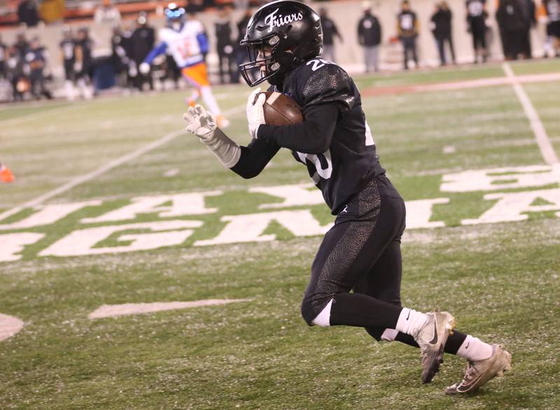 Fenwick's Ronan Morrissey runs the ball during the Class 6A State championship game on Tuesday, Dec. 2, 2025 in Hancock Stadium at Illinois State University in Normal.