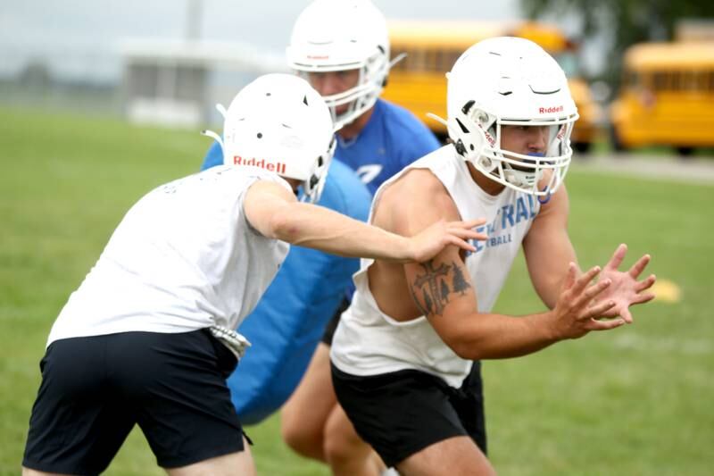 Burlington Central’s Michael Ganziano (right) practices with the team during the first official practice of the season on Monday, Aug. 8, 2022.