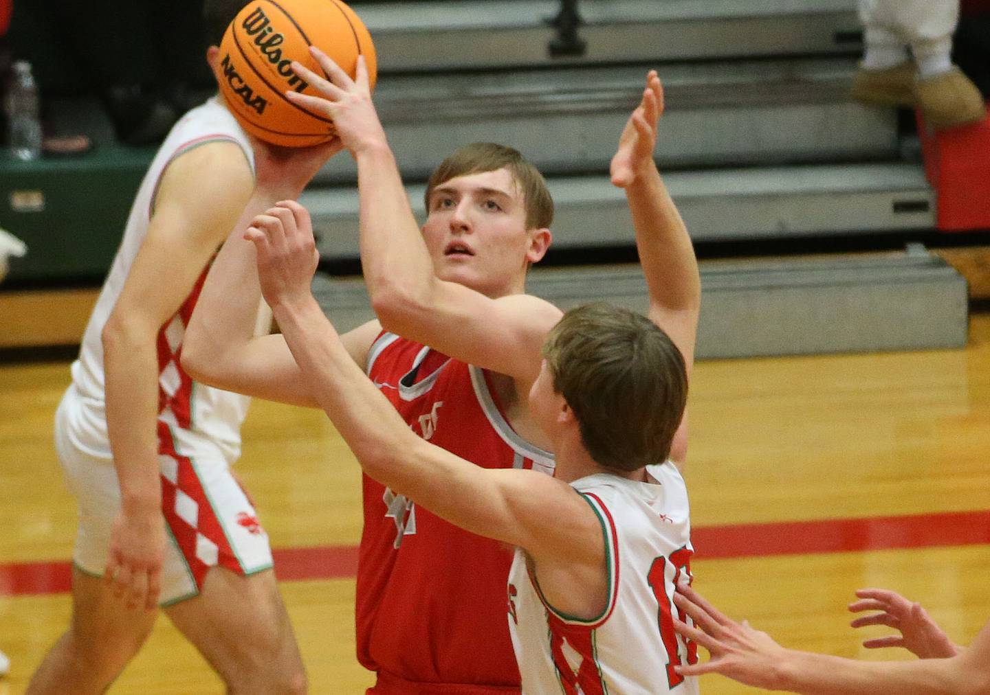 Streator's Nolan Lukach eyes the hoop as L-P's Braylin Bond defends on Tuesday, Jan. 14, 2025 in Sellett Gymnasium at L-P High School.