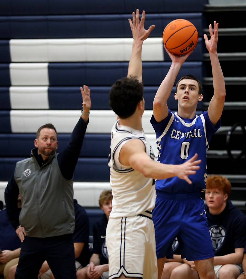 Burlington Central's Patrick Magan shoots the ball over Cary-Grove's Adam Bauer during a Fox Valley Conference  boys basketball game on Wednesday Jan. 7,  2026, at Cary-Grove High School, in Cary.